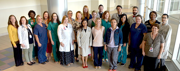 group photo of nurses, doctors and staff